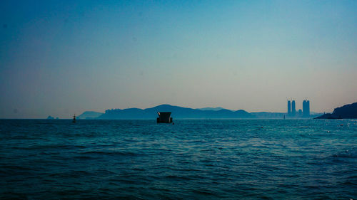 Scenic view of sea against clear sky