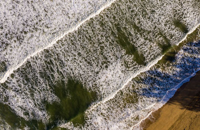 Aerial view of waves in sea