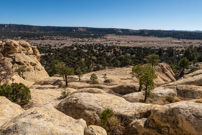 Scenic view of rocky mountains against clear sky