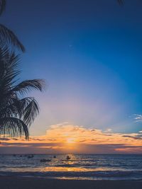 Scenic view of sea against sky at sunset