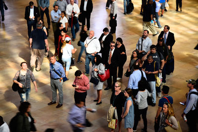 High angle view of people walking on street