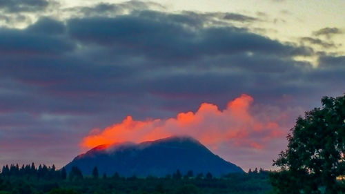 Scenic view of mountains against sky during sunset