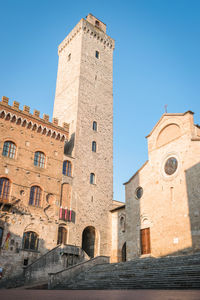 Low angle view of historical building against blue sky