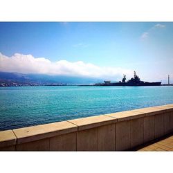 Scenic view of sea against blue sky