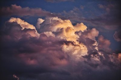 Low angle view of clouds in sky during sunset