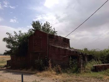 Built structure against cloudy sky