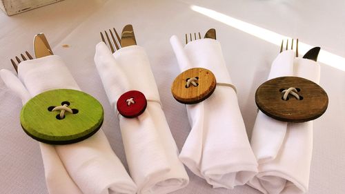 Close-up of cutlery wrapped in napkin