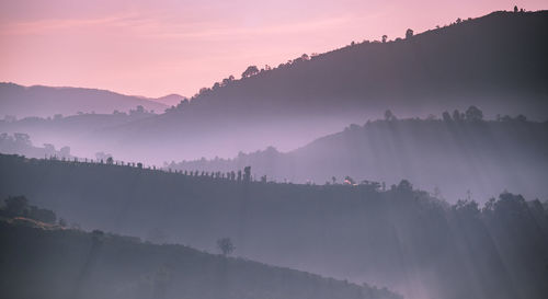 Scenic view of mountains against sky during sunset