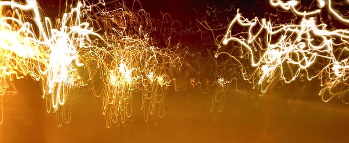 Close-up of illuminated star at night