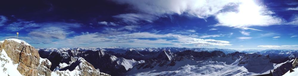 Scenic view of snowcapped mountains against sky