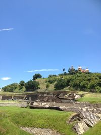 Scenic view of landscape against clear blue sky