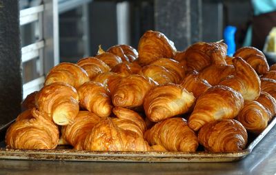 Close-up of fresh croissants in baking tray