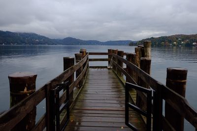 Pier over sea against sky