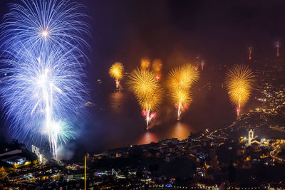 Firework display at night