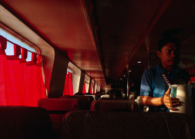 Man sitting in bus