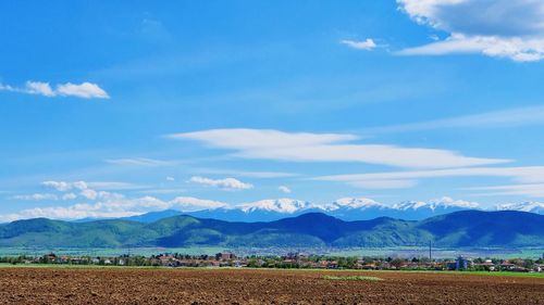 Scenic view of field against sky