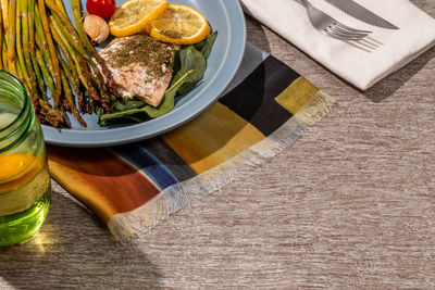 High angle view of fruits in plate on table