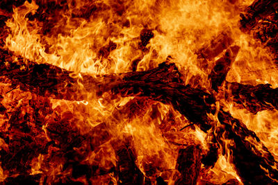 Close-up of fire burning at night