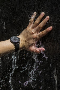 Close-up of hand in water