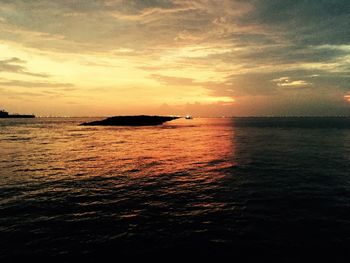 Scenic view of sea at sunset