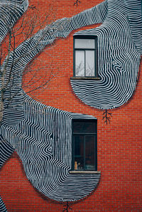 Full frame shot of brick wall with windows