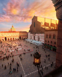 San petronio dome and piazza maggiore during an amazing golden hour moment - bologna