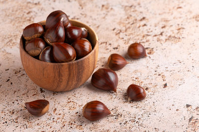 Close-up of chestnuts on table