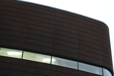 Low angle view of modern building against sky