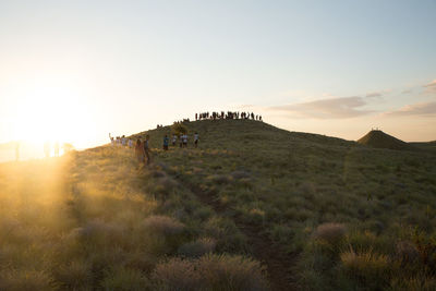 Scenic view of landscape against sky during sunset