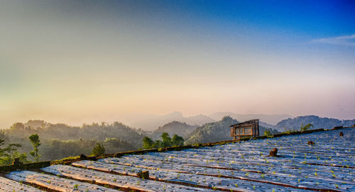 High angle view of roof and mountains against sky