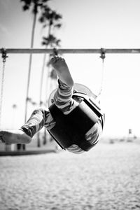 Full length of young woman standing on ground