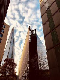 Low angle view of skyscrapers against sky