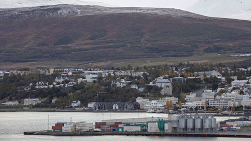 Scenic view of buildings and mountains