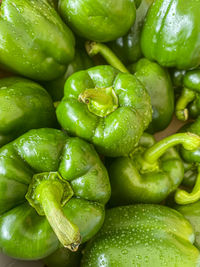 Full frame shot of green chili peppers in market