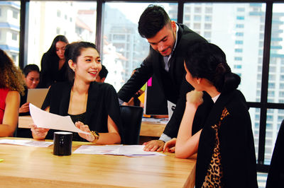 Group of people working on table