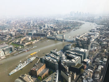 View to the dusty skyline of city of london and the thames