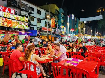 People on street market in city