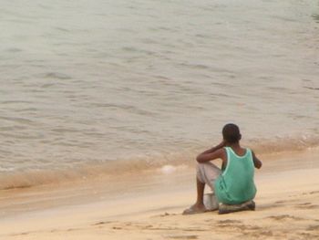 Woman standing on beach