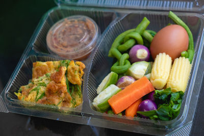 High angle view of vegetables in container