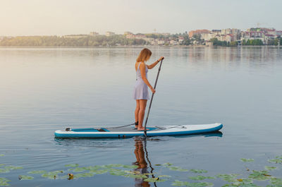 Woman on boat in lake