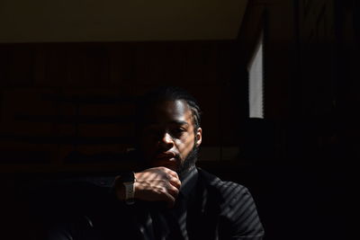 Portrait of young man looking away
