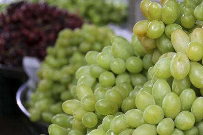 Close-up of grapes at market for sale