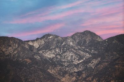Scenic view of mountains against sky during sunset