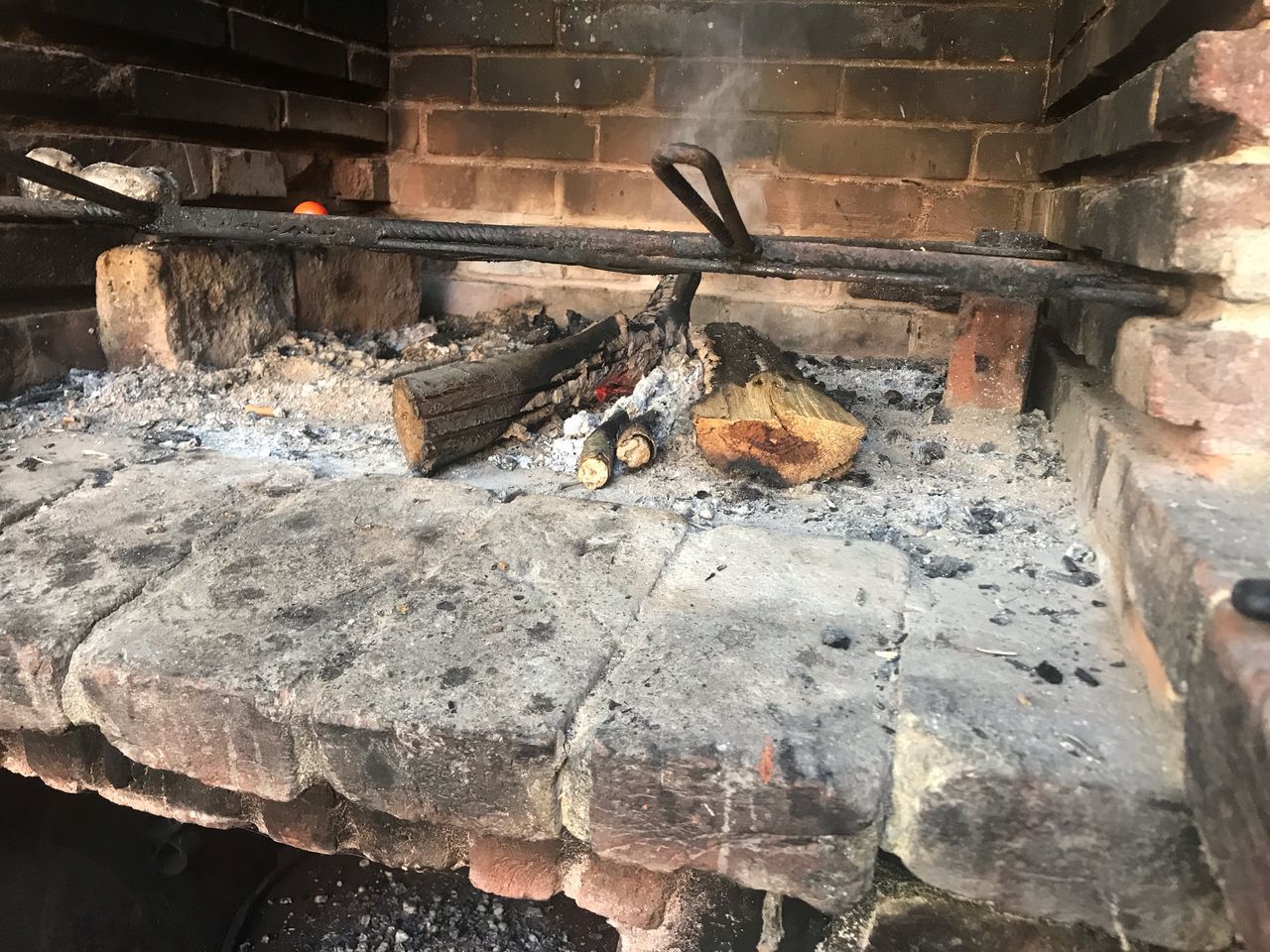 HIGH ANGLE VIEW OF FIRE ON LOG