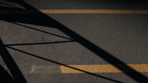 High angle view of shadow on road