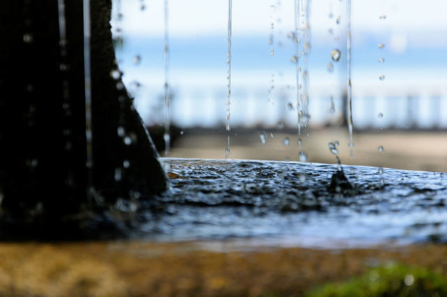 selective focus, surface level, water, cloud, sea, sky, nature, shore, tranquility, day, outdoors, tranquil scene, no people, ocean, scenics, wave, beauty in nature, waterfront