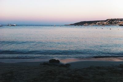 Scenic view of sea at sunset