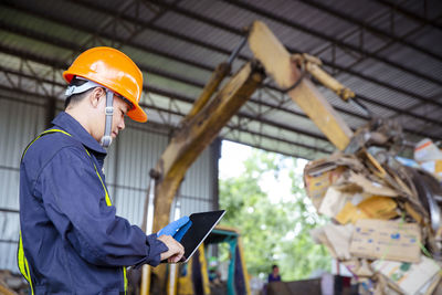 Rear view of people working