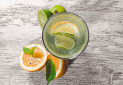 Fruits in glass on table