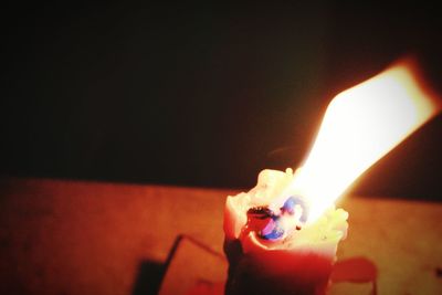 Close-up of lit candle